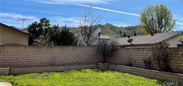 3570 Gettysburg Dr, Riverside, CA 92503 - view of yard featuring a fenced backyard and a mountain view