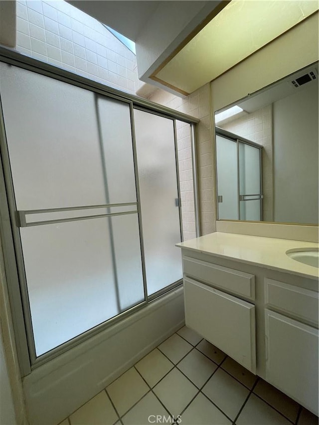 3570 Gettysburg Dr, Riverside, CA 92503 - bathroom with enclosed tub / shower combo, vanity, and tile patterned floors