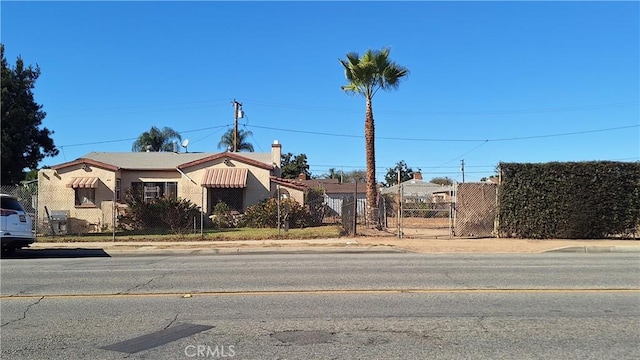 view of front of property with fence