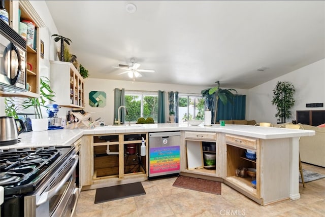 68820 San Felipe Rd, Cathedral City, CA 92234 - kitchen featuring appliances with stainless steel finishes, open shelves, and tile countertops