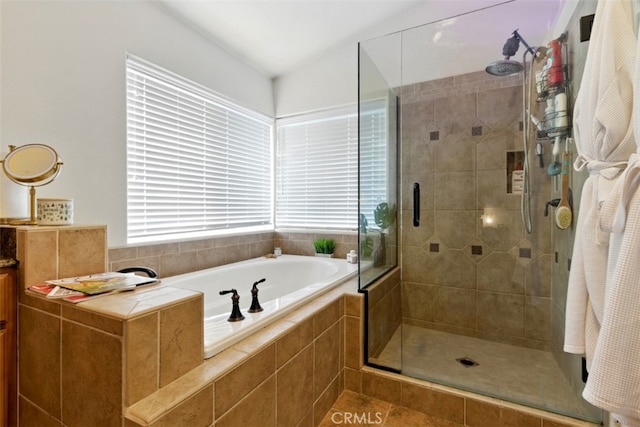 68820 San Felipe Rd, Cathedral City, CA 92234 - full bathroom featuring a bath, a shower stall, and tile patterned flooring