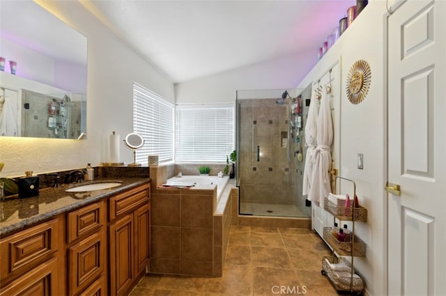 68820 San Felipe Rd, Cathedral City, CA 92234 - full bath with lofted ceiling, a bath, a stall shower, vanity, and tile patterned floors