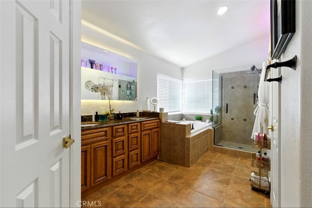 68820 San Felipe Rd, Cathedral City, CA 92234 - full bathroom with double vanity, a stall shower, a bath, and tile patterned floors