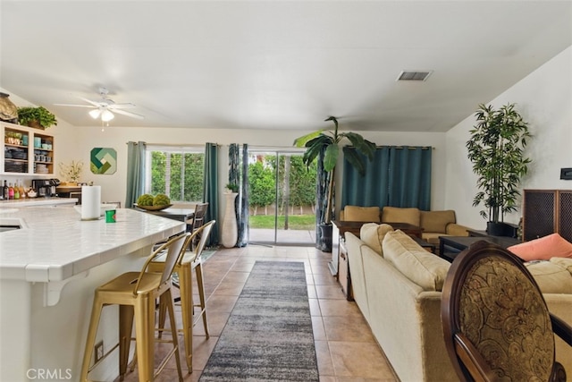 68820 San Felipe Rd, Cathedral City, CA 92234 - living room featuring ceiling fan and light tile patterned floors