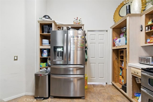 68820 San Felipe Rd, Cathedral City, CA 92234 - kitchen with appliances with stainless steel finishes, open shelves, baseboards, and light tile patterned floors