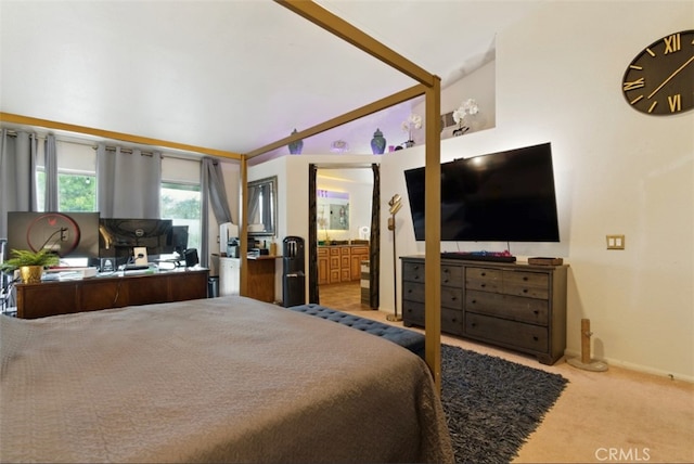 68820 San Felipe Rd, Cathedral City, CA 92234 - bedroom featuring vaulted ceiling, carpet, connected bathroom, and baseboards