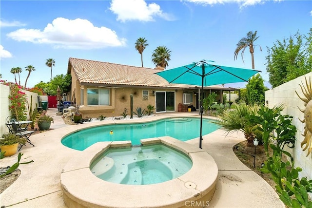 68820 San Felipe Rd, Cathedral City, CA 92234 - view of pool featuring a patio, a fenced backyard, and a pool with connected hot tub