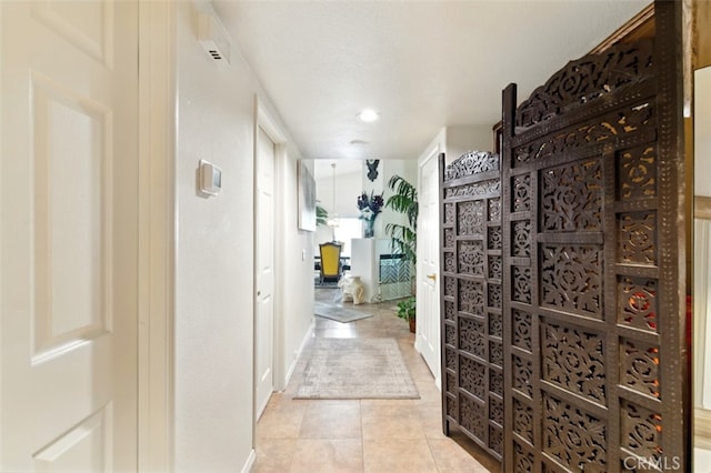 68820 San Felipe Rd, Cathedral City, CA 92234 - hallway with tile patterned floors, recessed lighting, and baseboards