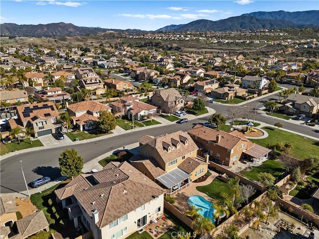 drone / aerial view with a residential view and a mountain view