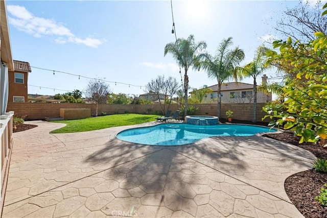 view of swimming pool with a patio area, a fenced backyard, and a pool with connected hot tub