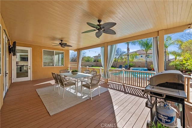 sunroom / solarium featuring wooden ceiling