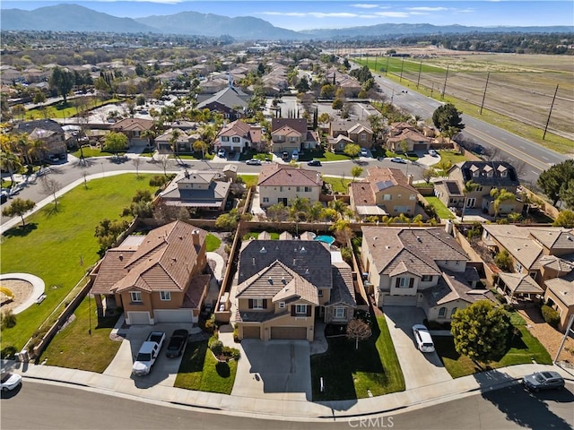 aerial view featuring a mountain view and a residential view