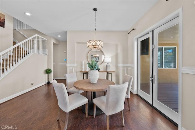 dining room with dark wood-style floors, french doors, stairway, and recessed lighting