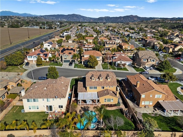 drone / aerial view with a residential view and a mountain view