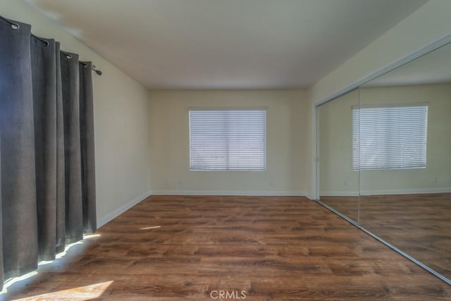 8371 Hawthorne St, Rancho Cucamonga, CA 91701 - unfurnished bedroom featuring wood finished floors and a closet