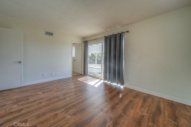 8371 Hawthorne St, Rancho Cucamonga, CA 91701 - empty room with baseboards and wood finished floors