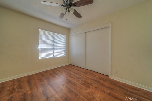 8371 Hawthorne St, Rancho Cucamonga, CA 91701 - unfurnished bedroom featuring wood finished floors, a closet, and a ceiling fan