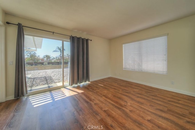 8371 Hawthorne St, Rancho Cucamonga, CA 91701 - spare room featuring wood finished floors and baseboards