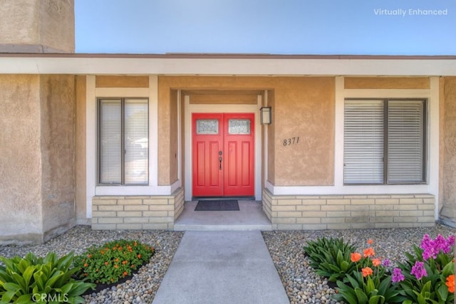 8371 Hawthorne St, Rancho Cucamonga, CA 91701 - view of exterior entry featuring stucco siding