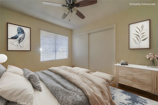 8371 Hawthorne St, Rancho Cucamonga, CA 91701 - bedroom featuring dark wood-style flooring, a closet, and a ceiling fan