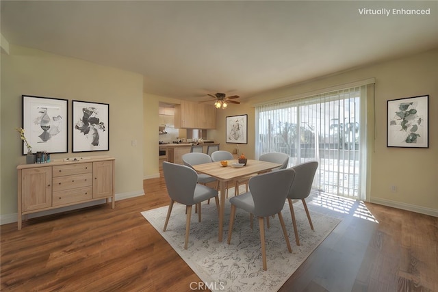 8371 Hawthorne St, Rancho Cucamonga, CA 91701 - dining area with dark wood-style flooring and a ceiling fan