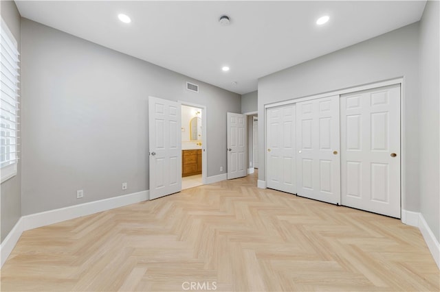 unfurnished bedroom with recessed lighting, visible vents, and baseboards