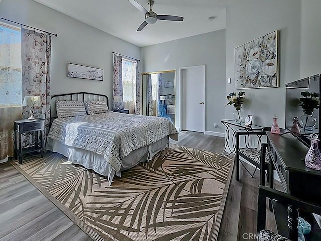 68262 Pasada Rd, Cathedral City, CA 92234 - bedroom with wood finished floors and ceiling fan