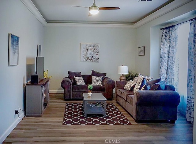68262 Pasada Rd, Cathedral City, CA 92234 - living area with wood finished floors, a ceiling fan, and ornamental molding