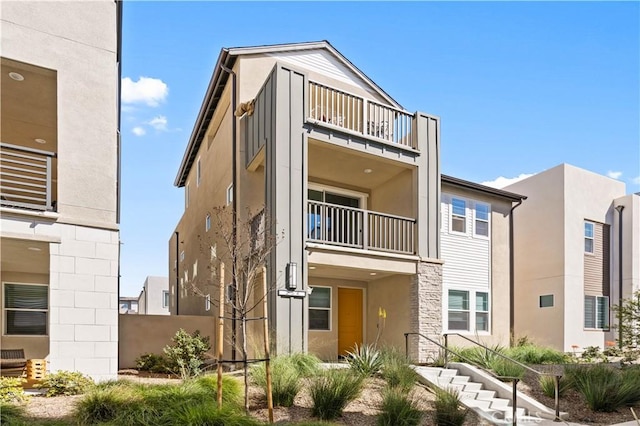 view of front of house featuring stucco siding