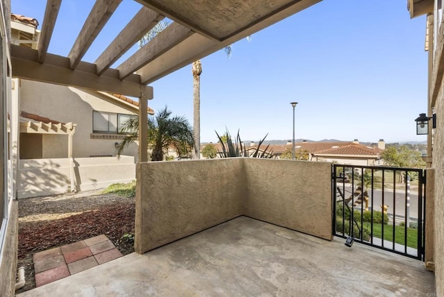 view of patio with a balcony