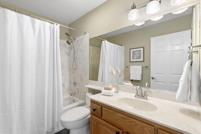 full bathroom with toilet, vanity, and shower / tub combo with curtain