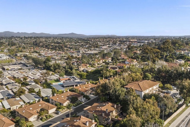 drone / aerial view with a residential view and a mountain view