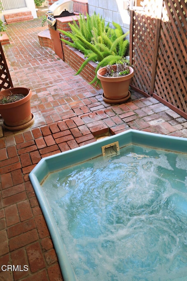 view of pool with a patio