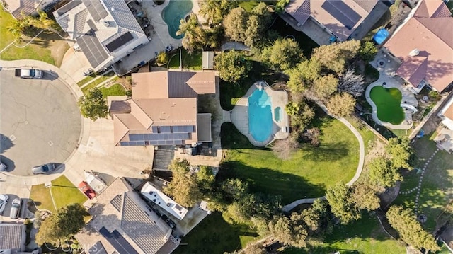 birds eye view of property with a residential view