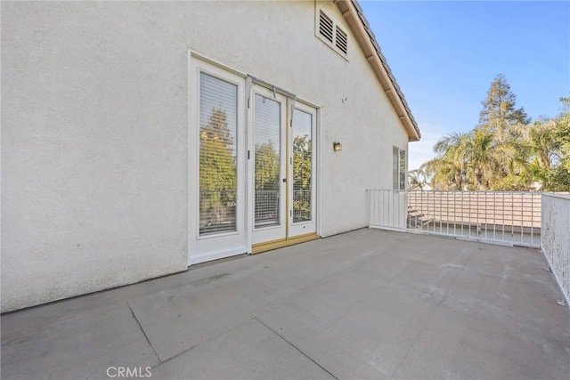 view of patio featuring visible vents