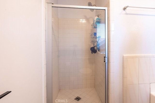 bathroom featuring a stall shower