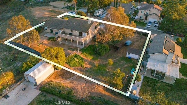 birds eye view of property with a residential view