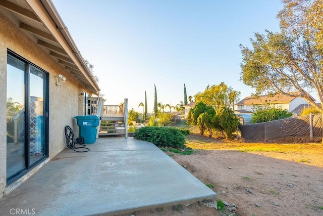 exterior space with a patio area and fence