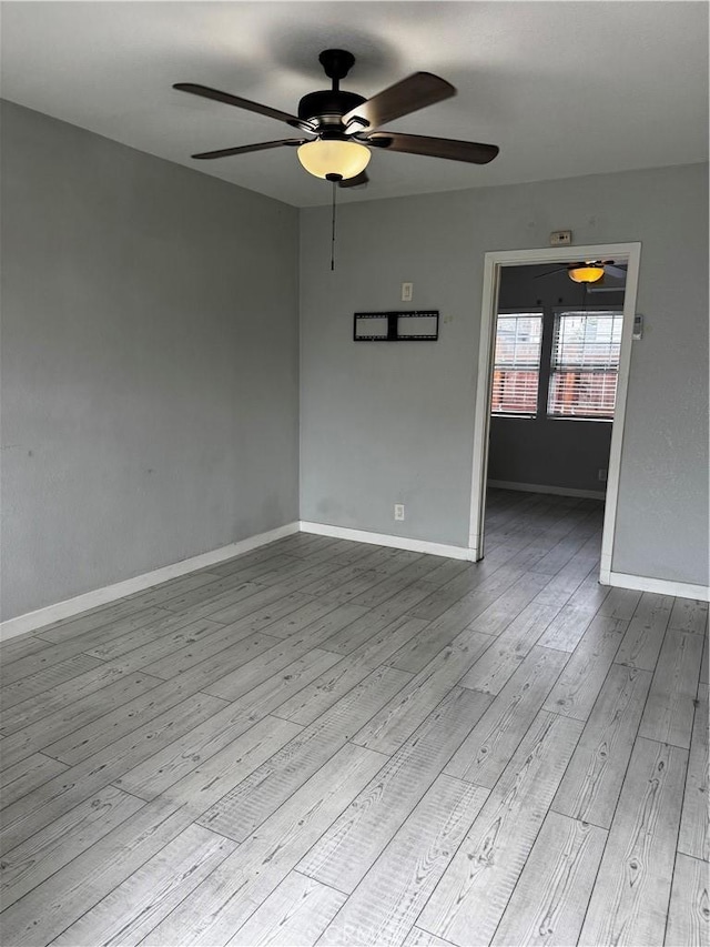 123 E Alondra Blvd, Compton, CA 90220 - unfurnished room featuring baseboards, a ceiling fan, and wood finished floors