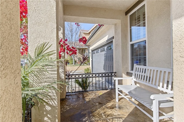 doorway to property with stucco siding