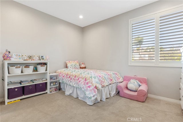 bedroom with light carpet, baseboards, and recessed lighting