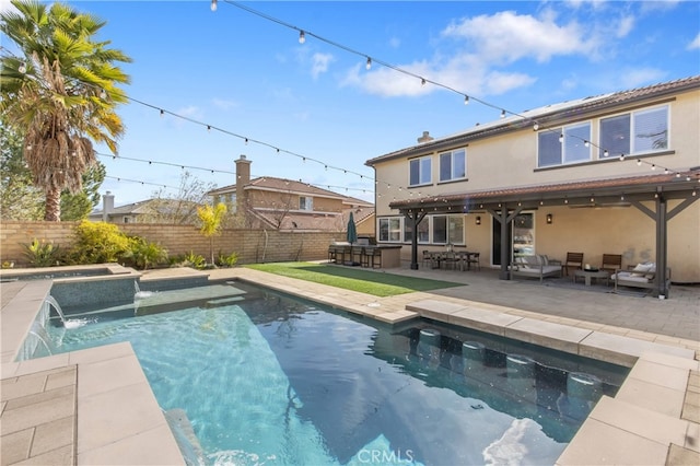 rear view of property featuring a fenced in pool, a fenced backyard, outdoor dry bar, an in ground hot tub, and stucco siding