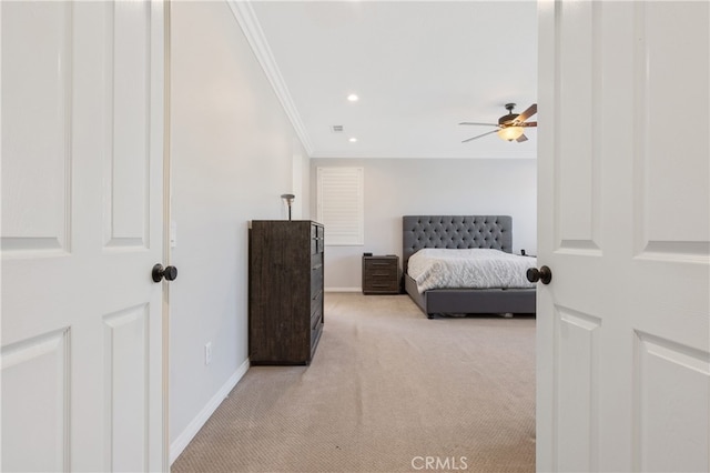 bedroom with baseboards, light colored carpet, ceiling fan, crown molding, and recessed lighting