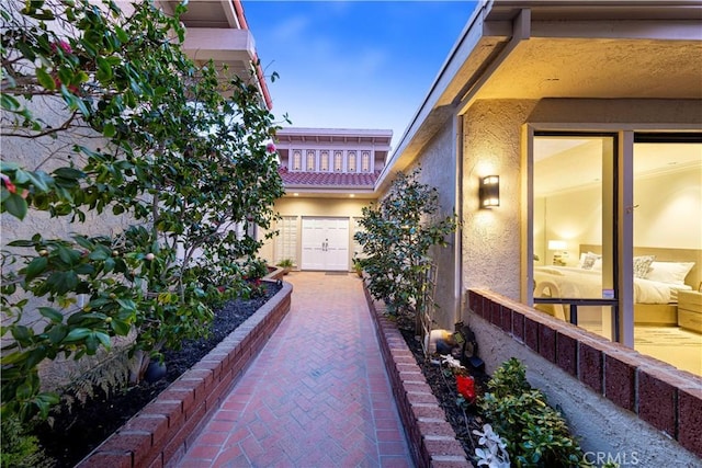 exterior space with stucco siding