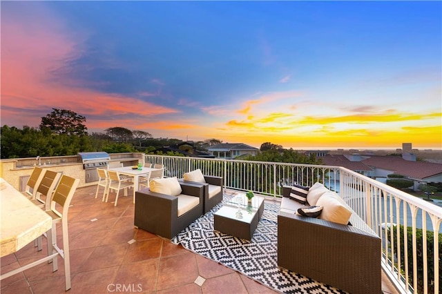 11 Montpellier, Newport Beach, CA 92660 - patio terrace at dusk featuring exterior kitchen, an outdoor living space, and a grill