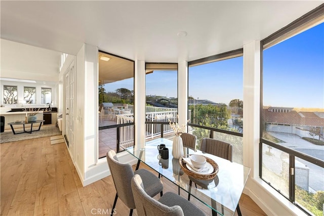 11 Montpellier, Newport Beach, CA 92660 - sunroom / solarium featuring hardwood / wood-style floors and baseboards