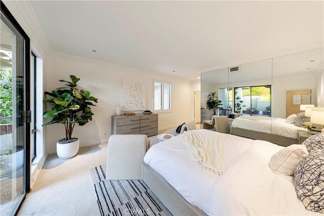 bedroom with crown molding, multiple windows, visible vents, and light colored carpet