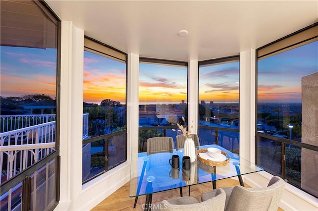 dining space featuring expansive windows