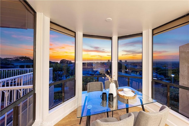 11 Montpellier, Newport Beach, CA 92660 - sunroom featuring floor to ceiling windows and wood finished floors