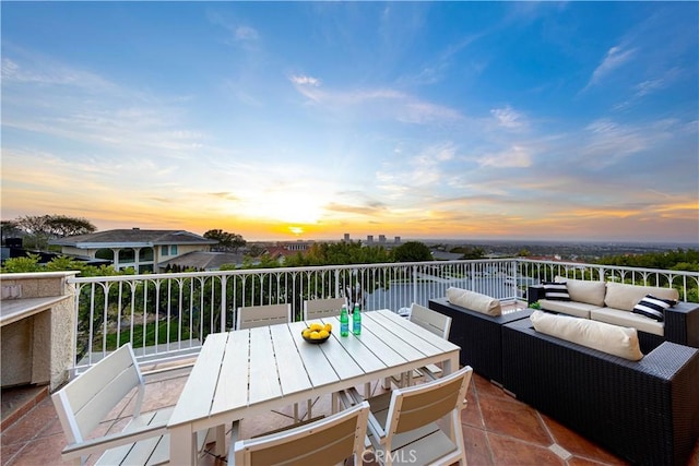 view of patio featuring an outdoor hangout area, outdoor dining area, and a balcony